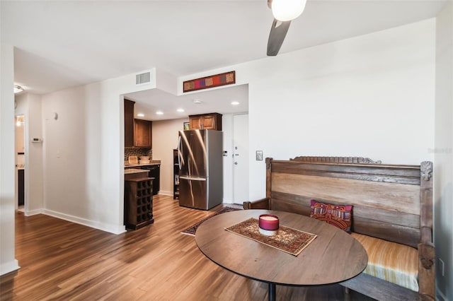 dining area featuring hardwood / wood-style flooring