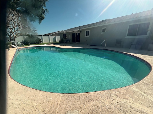 5730 16th Ln NE, Saint Petersburg, FL 33703 - view of pool featuring fence, a fenced in pool, and a patio area