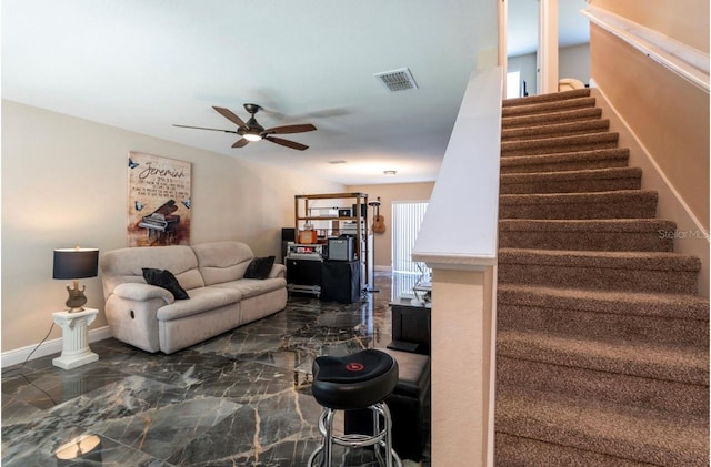 living room with ceiling fan