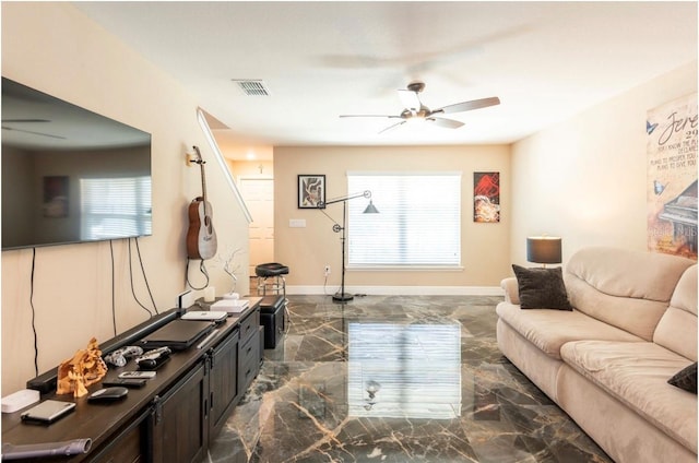 living room featuring ceiling fan