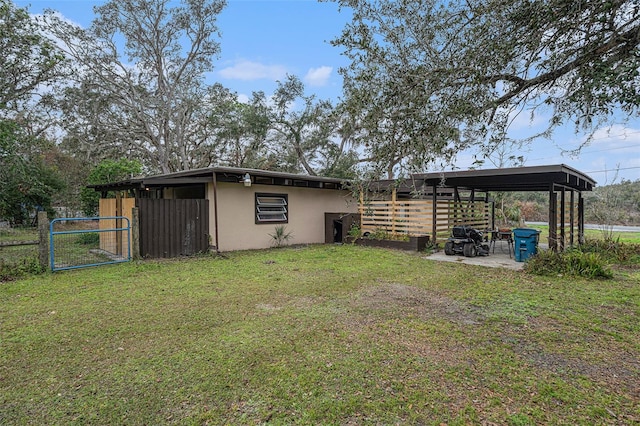 view of outdoor structure with a lawn