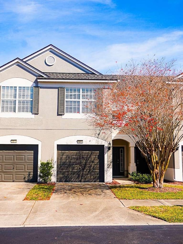 view of front of property with a garage