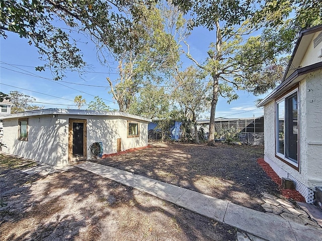 exterior space featuring an outbuilding