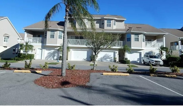 view of front of house featuring a balcony