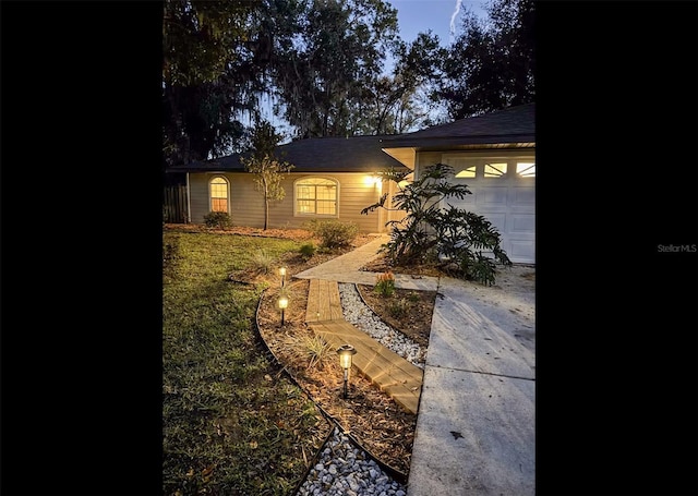 ranch-style home with a garage