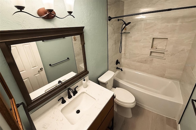 full bathroom featuring tiled shower / bath combo, vanity, hardwood / wood-style flooring, and toilet