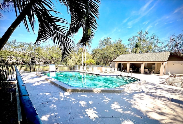 view of swimming pool featuring a patio