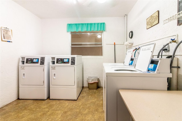 laundry room with washer and clothes dryer