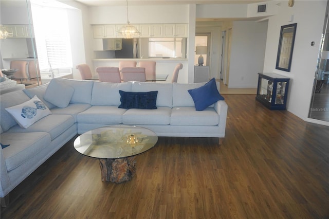 living room featuring dark hardwood / wood-style flooring