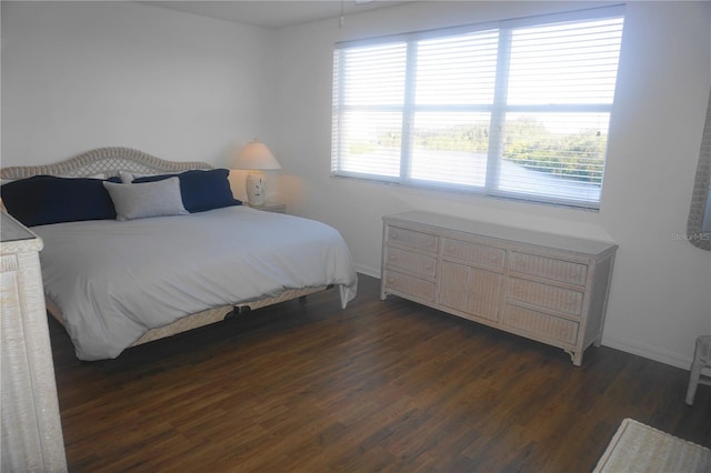 bedroom featuring dark hardwood / wood-style floors