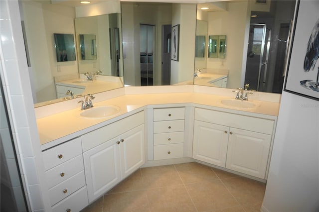 bathroom with vanity and tile patterned flooring