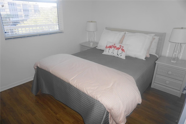 bedroom featuring dark hardwood / wood-style floors