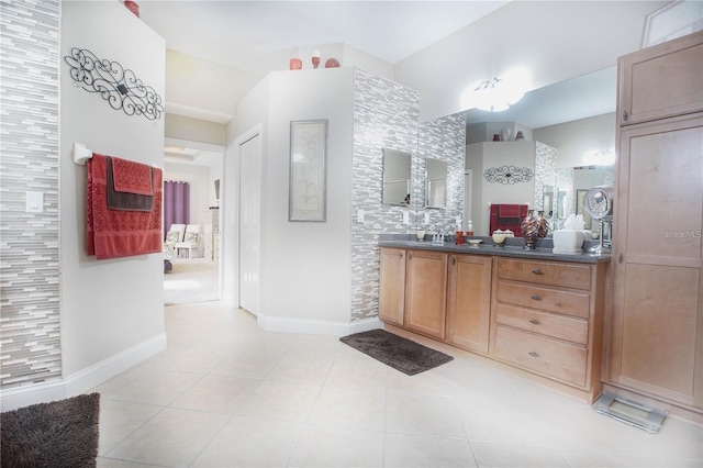 bathroom featuring tile patterned floors and vanity