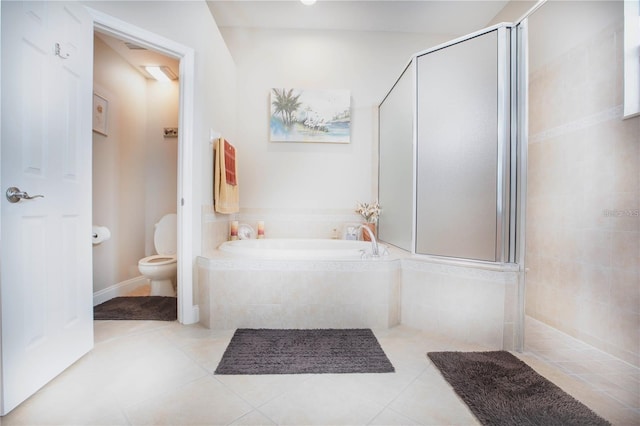 bathroom with independent shower and bath, tile patterned floors, and toilet