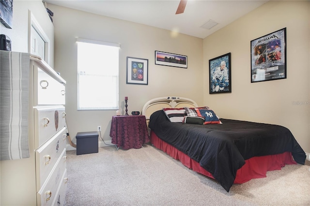 carpeted bedroom with ceiling fan