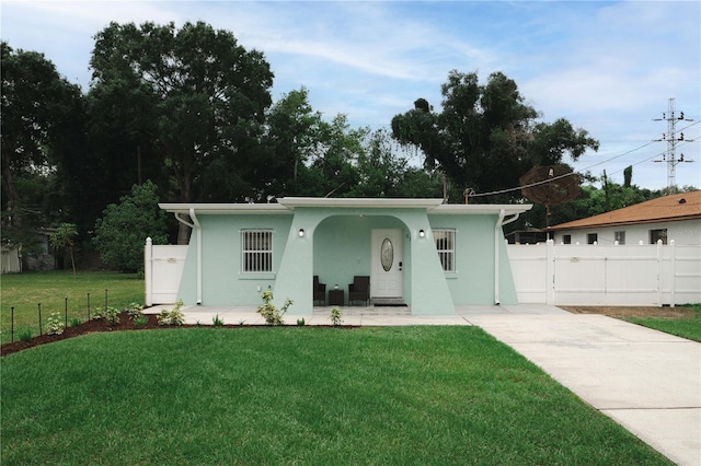 ranch-style home with a front yard