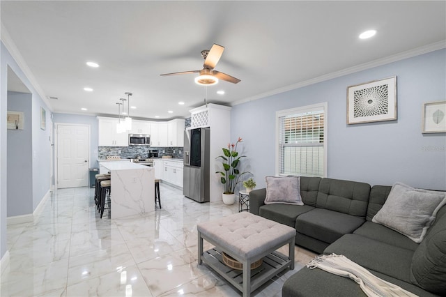 living room with crown molding and ceiling fan