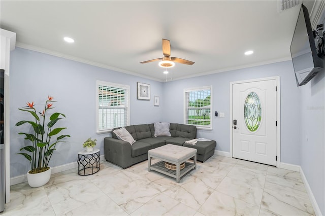 living room featuring ornamental molding and ceiling fan