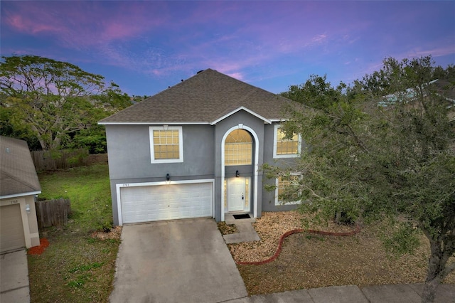 view of property with a garage