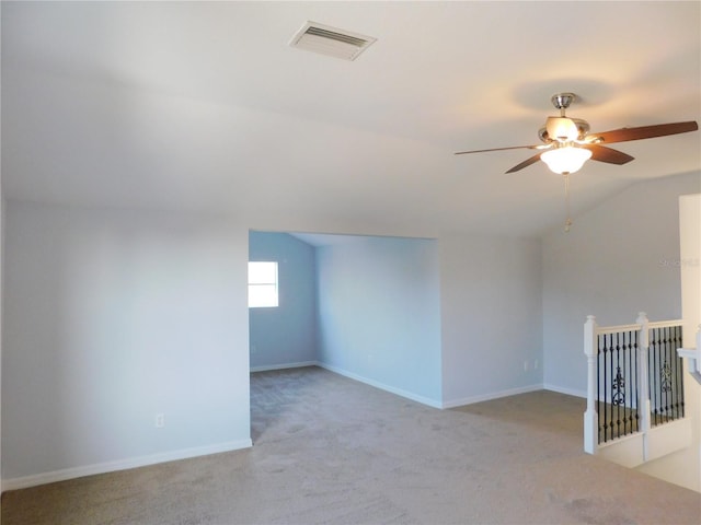 bonus room featuring vaulted ceiling, light colored carpet, and ceiling fan