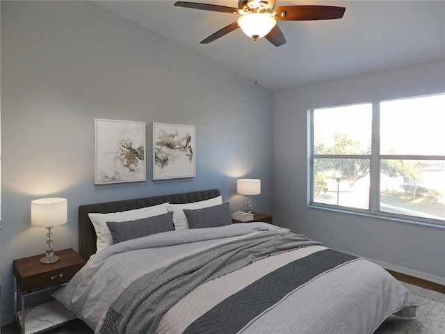 bedroom featuring lofted ceiling and ceiling fan