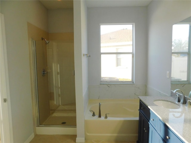 bathroom featuring independent shower and bath and vanity