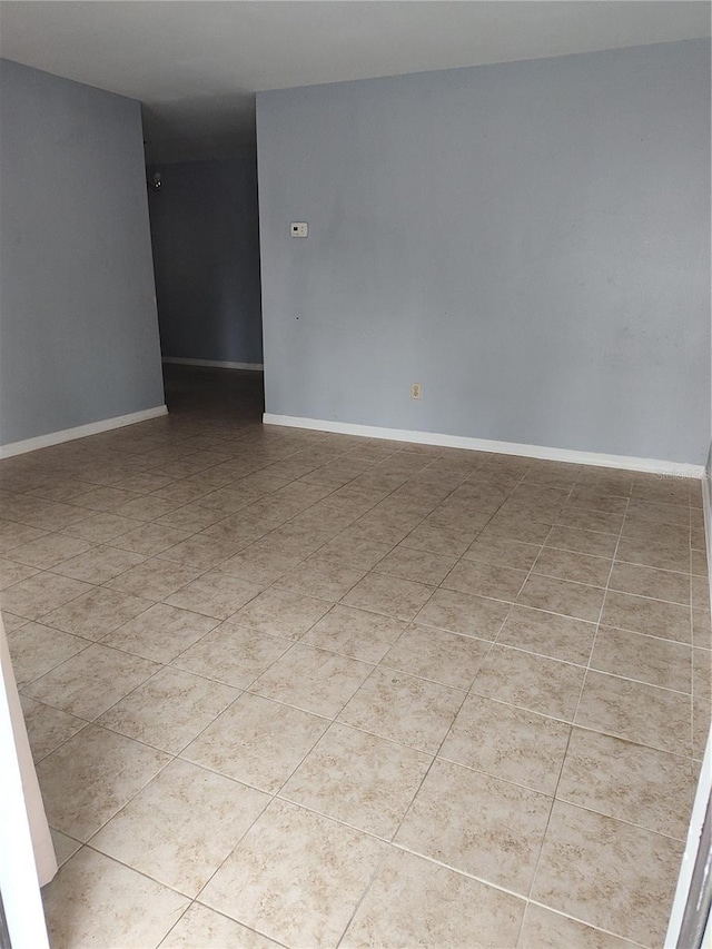 view of tiled empty room