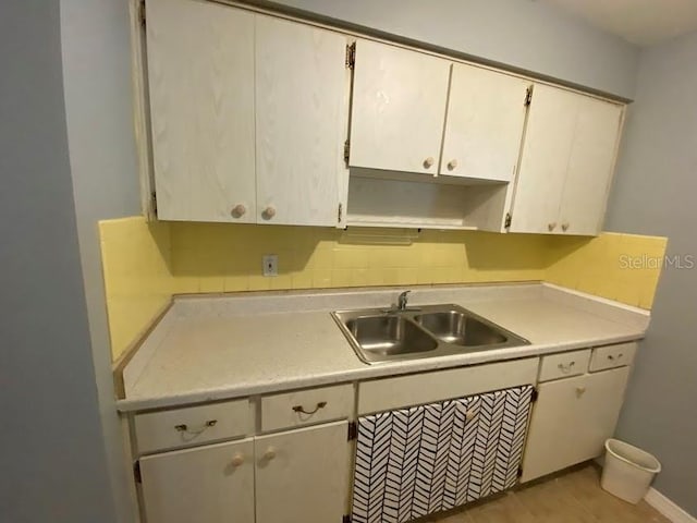 kitchen with sink and backsplash