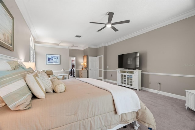 bedroom with crown molding, ceiling fan, and carpet