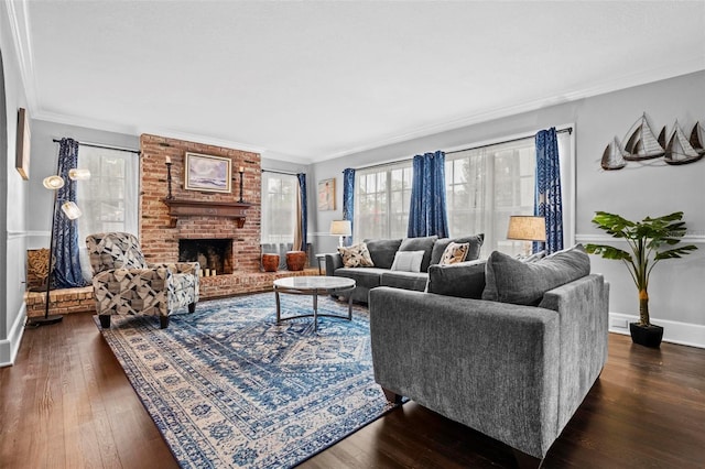 living room featuring dark hardwood / wood-style flooring, ornamental molding, and a fireplace