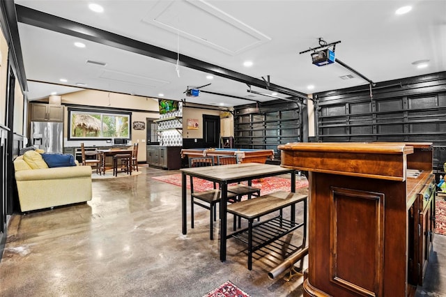 game room featuring concrete flooring