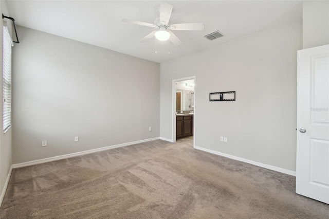 unfurnished room with light carpet and ceiling fan