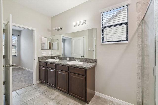 bathroom with tile patterned floors and vanity