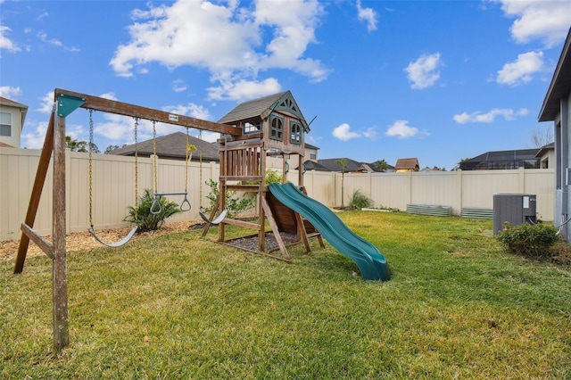 view of jungle gym with a yard and central AC unit