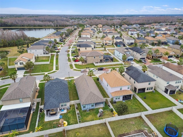 bird's eye view with a water view