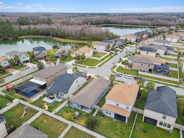 drone / aerial view with a water view