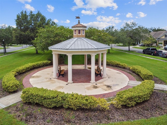 view of community featuring a gazebo and a lawn