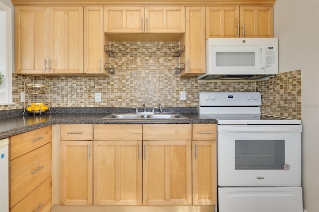 kitchen with white appliances, sink, light brown cabinets, and backsplash