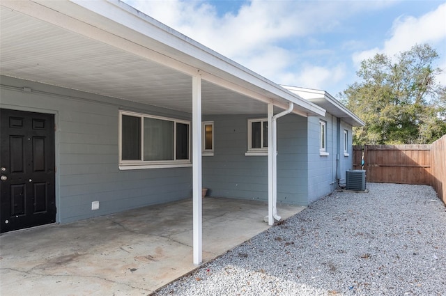 view of side of home with cooling unit