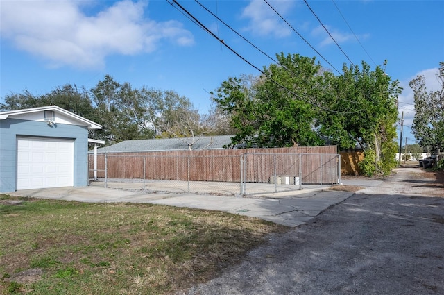 view of yard featuring a garage