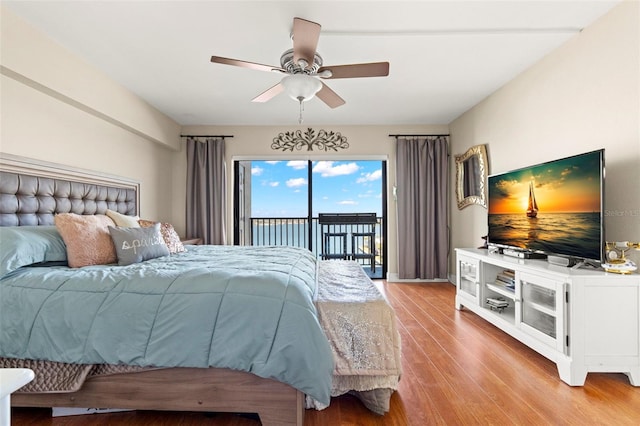 bedroom featuring ceiling fan, access to exterior, and light wood-type flooring