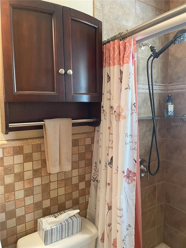 bathroom with a shower with shower curtain