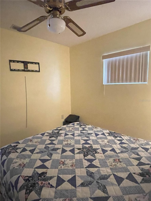 unfurnished bedroom with ceiling fan