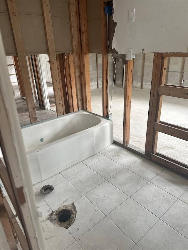 bathroom featuring tile patterned flooring