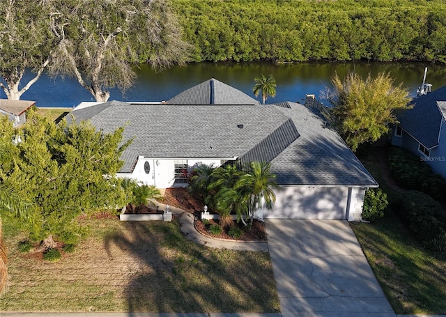 birds eye view of property featuring a water view