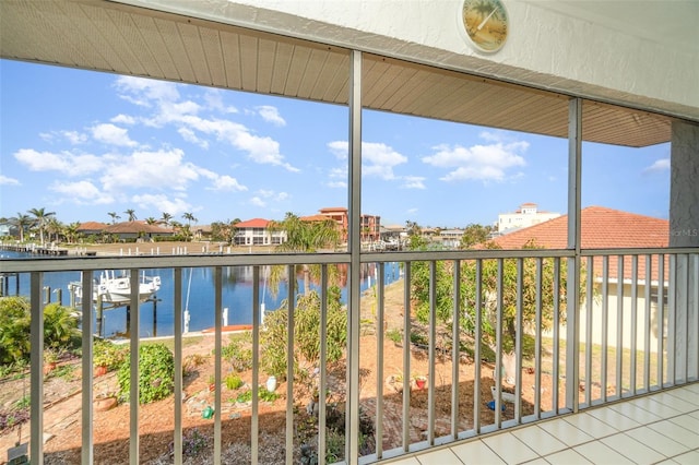 balcony featuring a water view