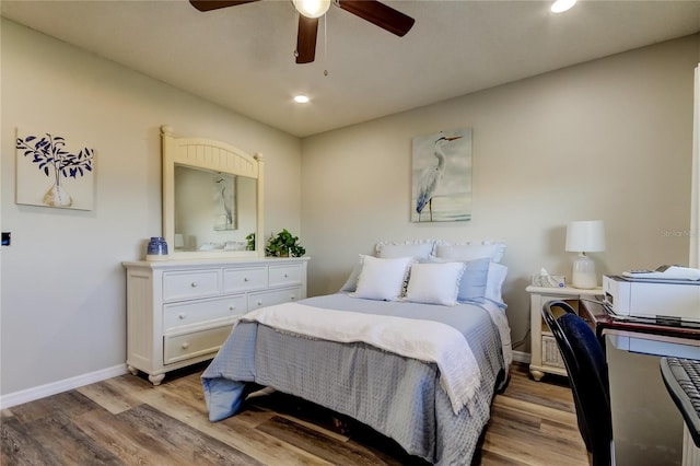 bedroom featuring ceiling fan and light wood-type flooring