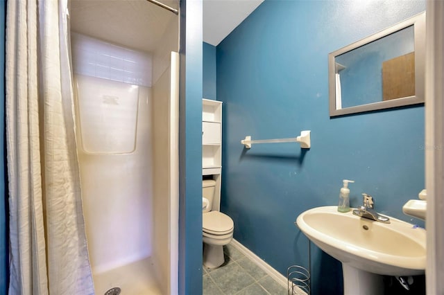 bathroom with toilet, sink, tile patterned flooring, and a shower with shower curtain