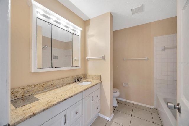 full bathroom with tile patterned floors, toilet, tiled shower / bath combo, and vanity