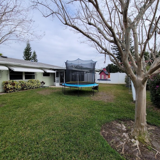 view of yard featuring a trampoline